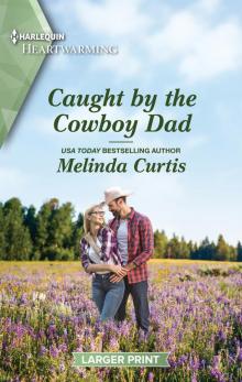 Caught by the Cowboy Dad Read online