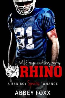 RHINO: A Bad Boy Sports Romance (With FREE Bonus Novel OFFSIDE!) Read online